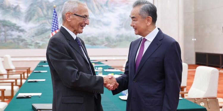 Wang Yi meets U.S. climate envoy in Beijing