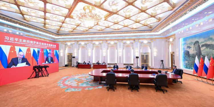 Xi, Putin pledge stronger China, Russia ties