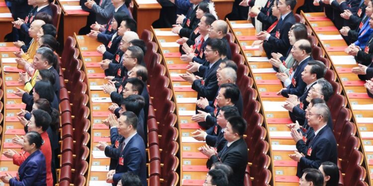 Chinese national lawmakers pass work report of NPC Standing Committee