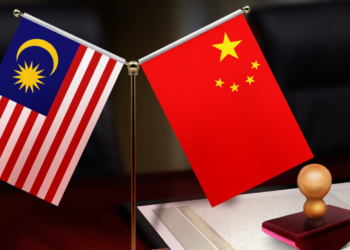 China, Malaysia discuss trade ties, oppose U.S. tariffs