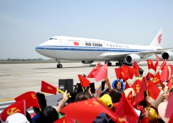 Xi lands in Hanoi for state visit to Vietnam