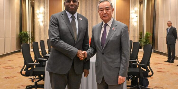 Chinese FM meets British counterpart on bilateral ties